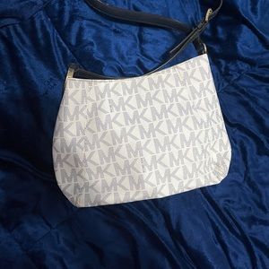 Navy blue Michael kors crossbody.